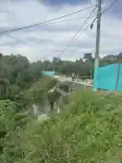Presencia de maquinaria y trabajadores realizando labores de desmonte en el sector del Puente Santa Elena.